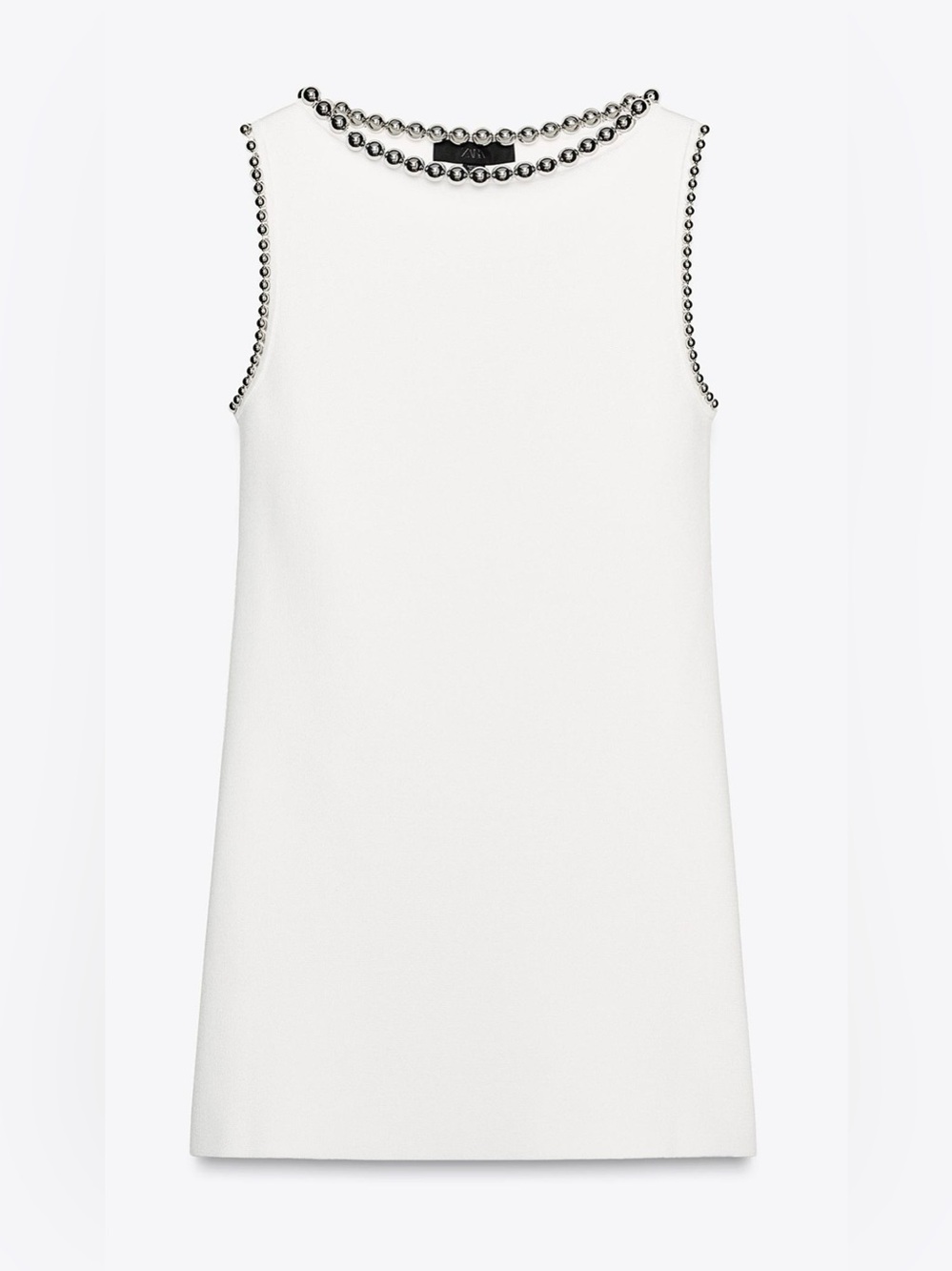 Sleeveless White Knit Dress with Beaded Neckline